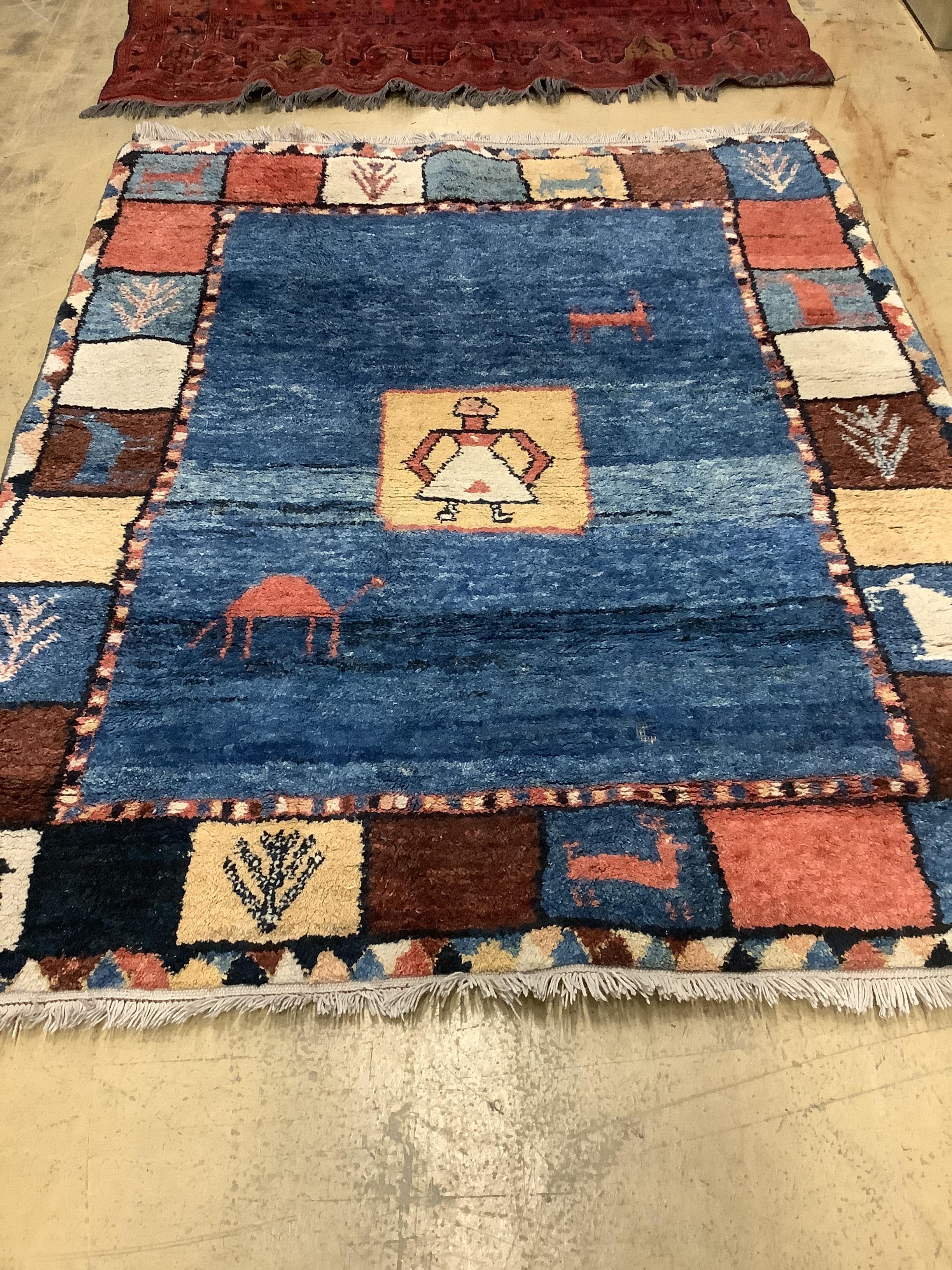 A Gabbeh blue ground carpet, 180cm x 148cm